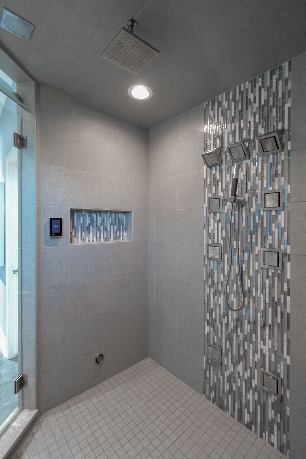 Lake country Kohler DTV digital showering system with mosaic accent tile
