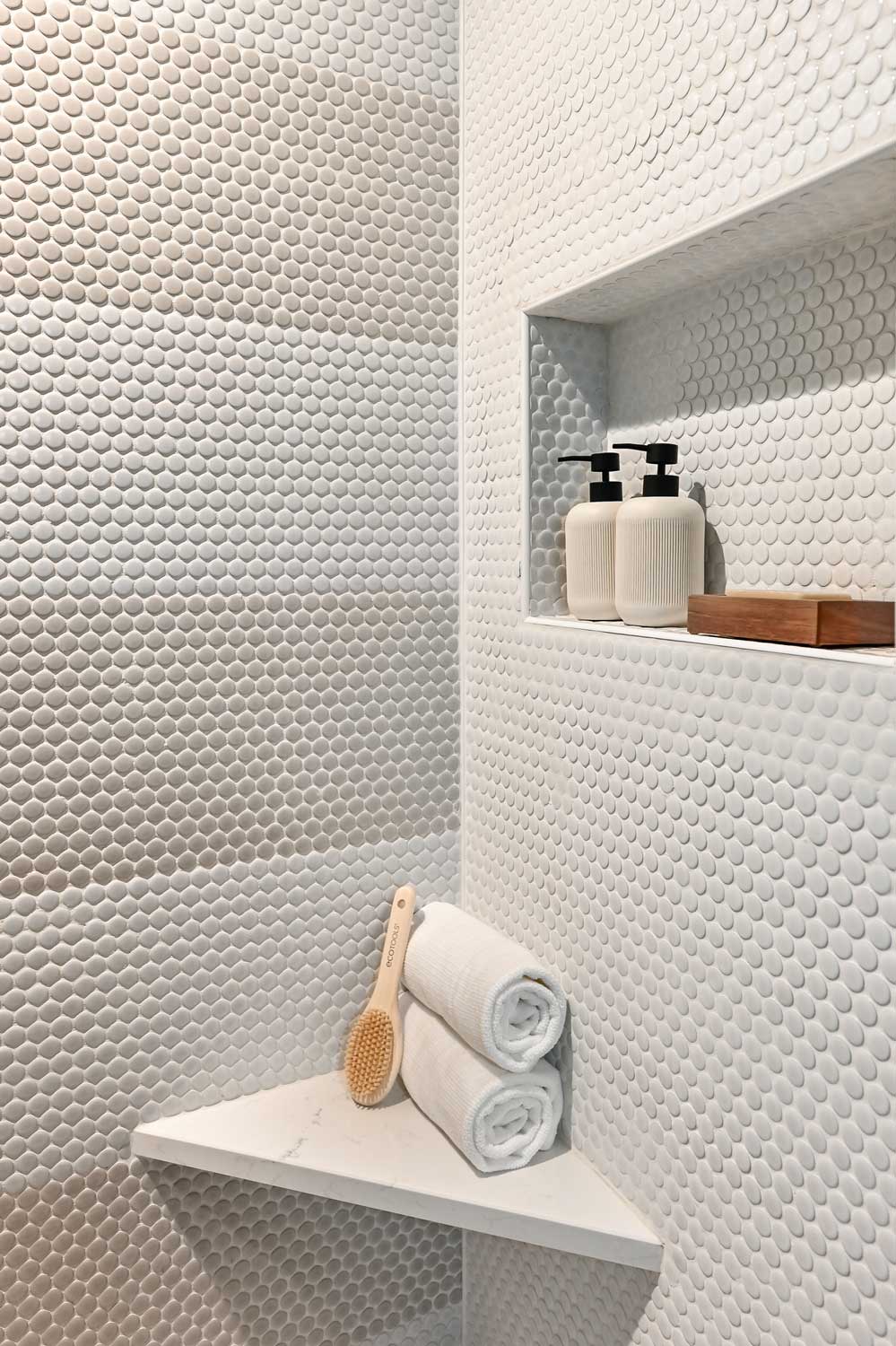 penny tile shower and niche