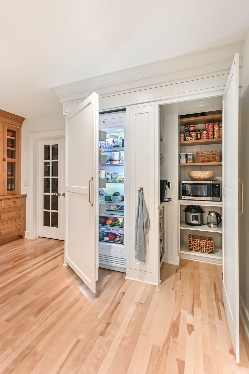 hidden pantry and refrigerator