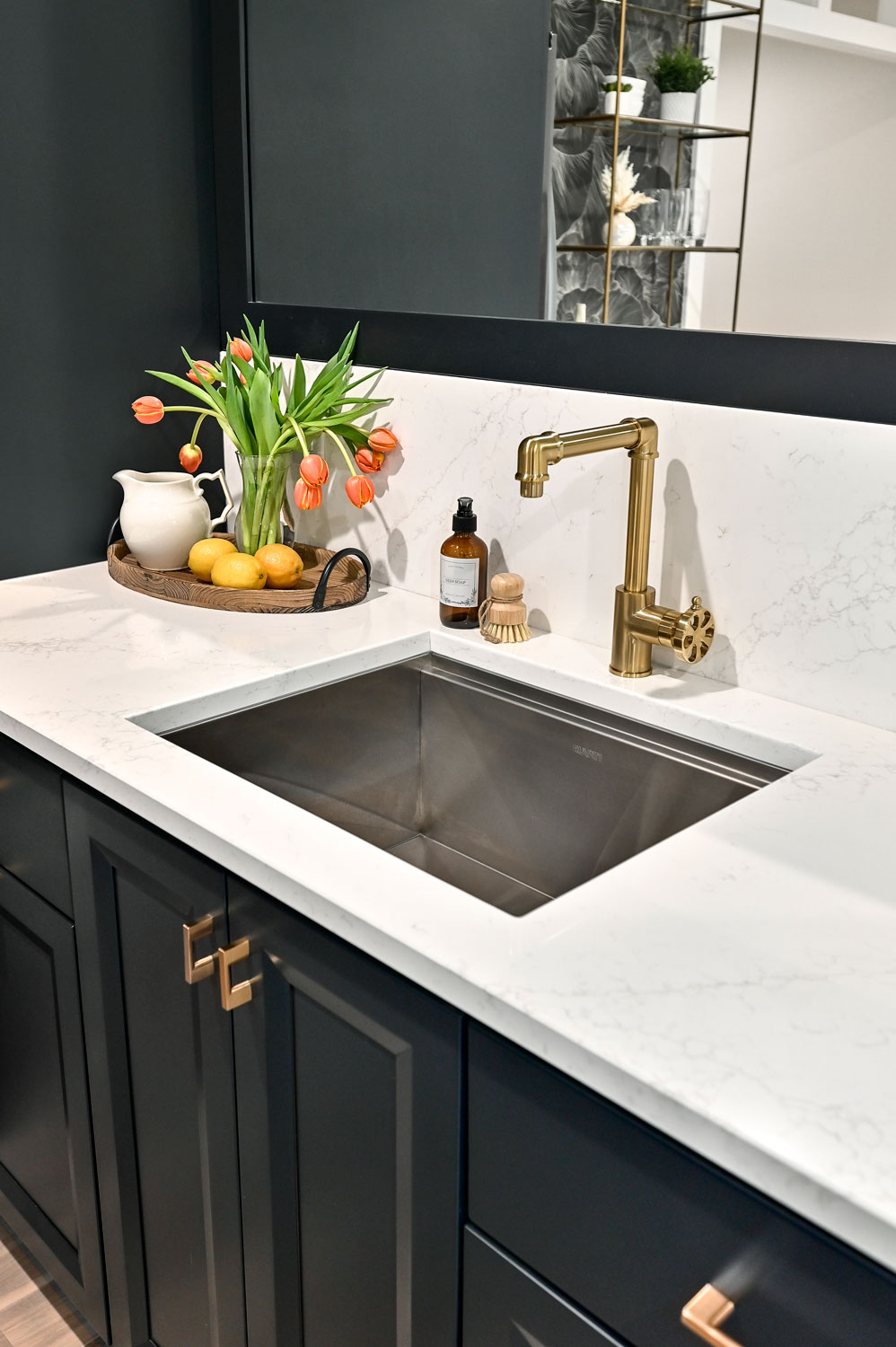 sink with gold faucet